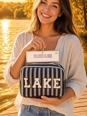Gloss & Glo - “LAKE” Cosmetic Bag Black & White Striped with Gold Trim Font